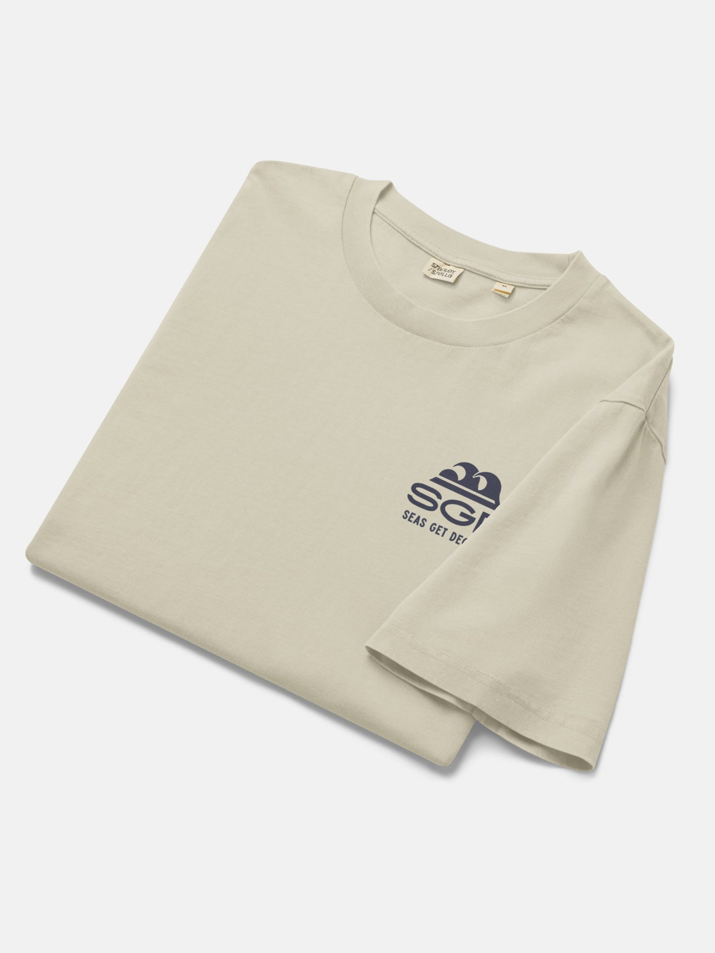 Easy Enough Tee folded flat lay in stone — Seas Get Degrees