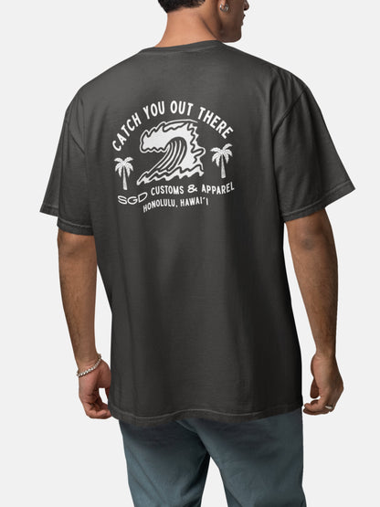 Model wearing Endless Wave Tee back in black rock — Seas Get Degrees men's coastal tee