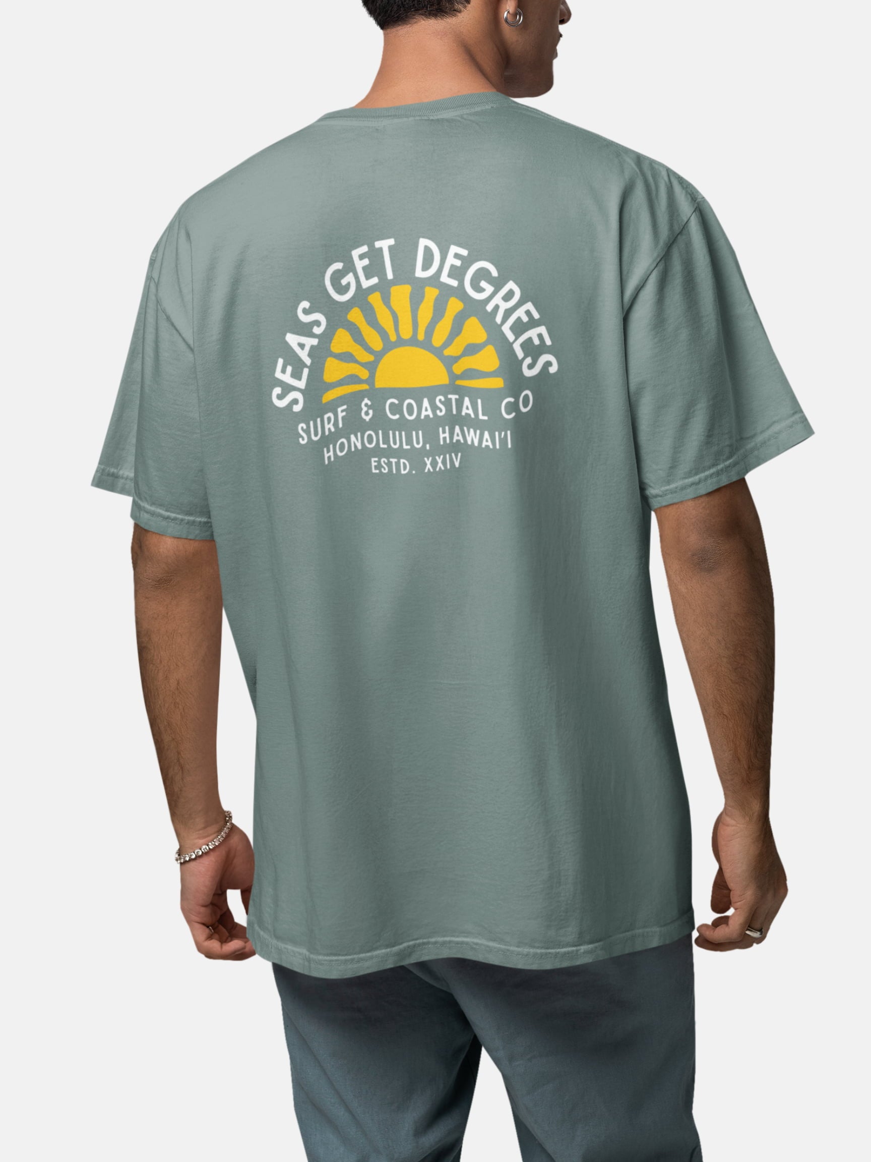 Model wearing Golden Tide Tee back in green bay — Seas Get Degrees men's coastal tee