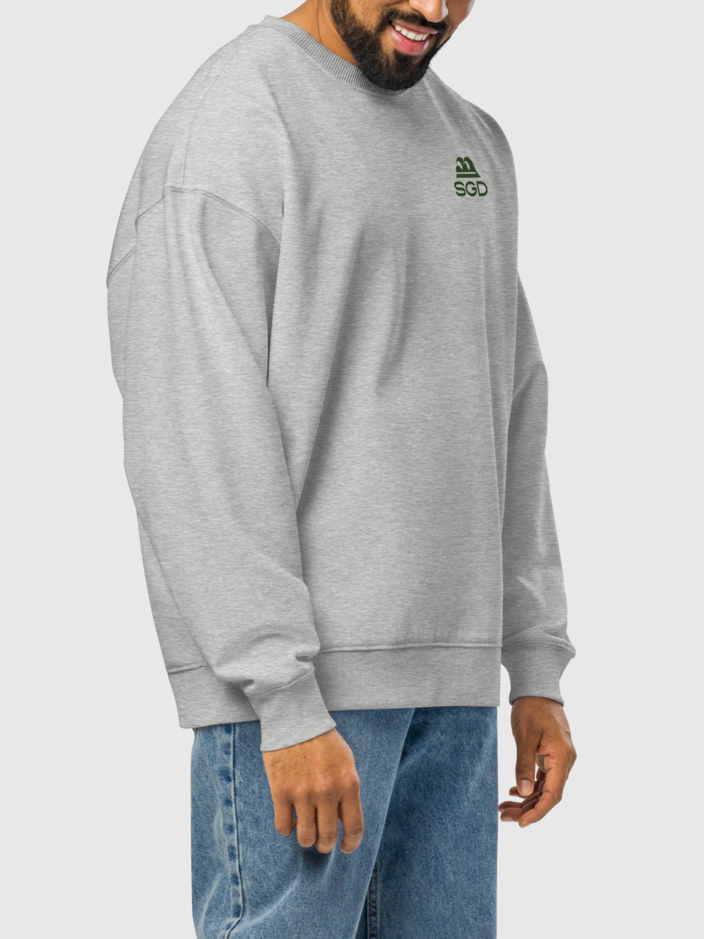 Model wearing Live Swell Oversized Sweatshirt front side in heather grey — Seas Get Degrees men's coastal sweatshirt