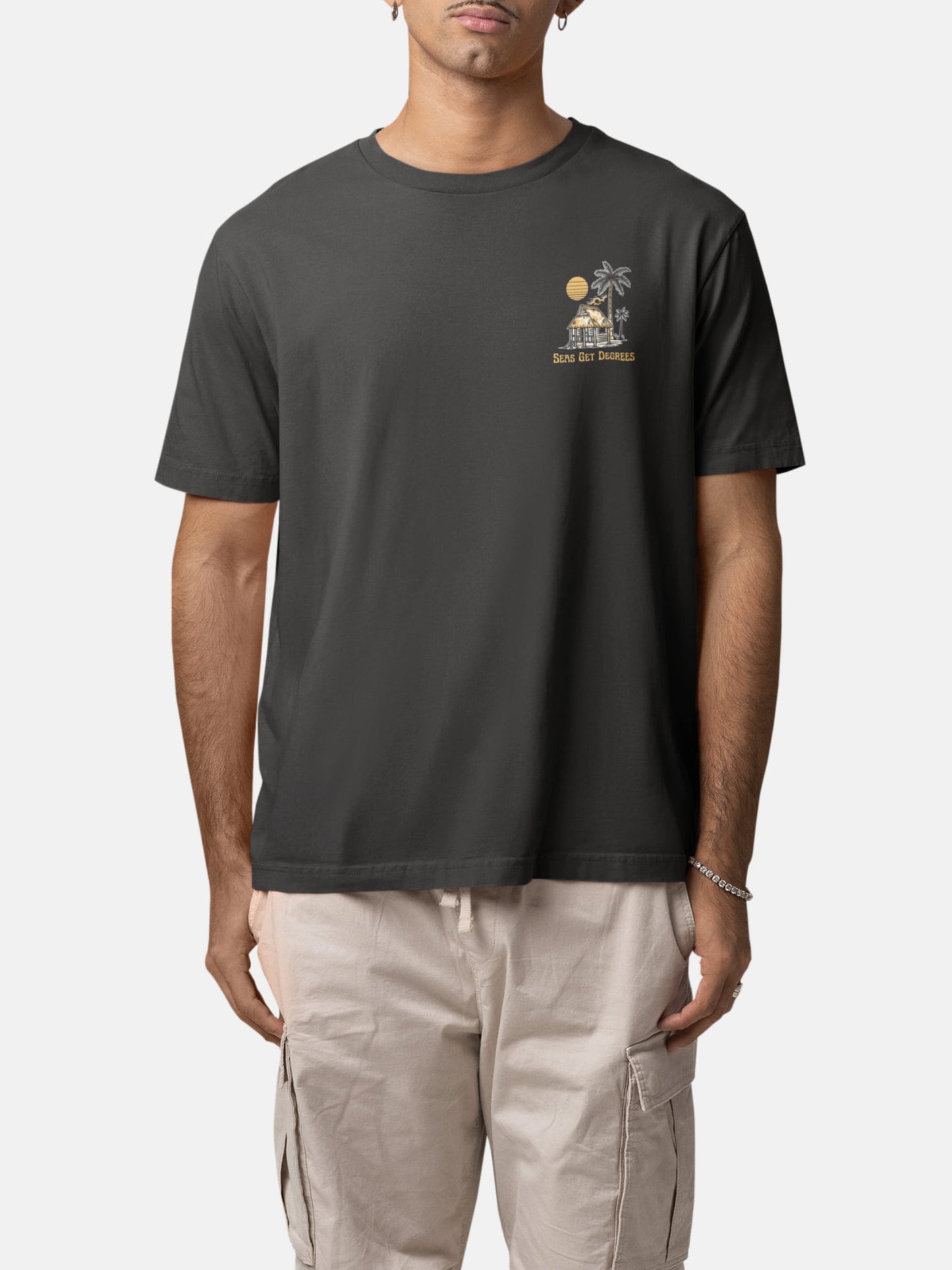 Model wearing Lost and Found Tee front in black rock — Seas Get Degrees men's coastal tee