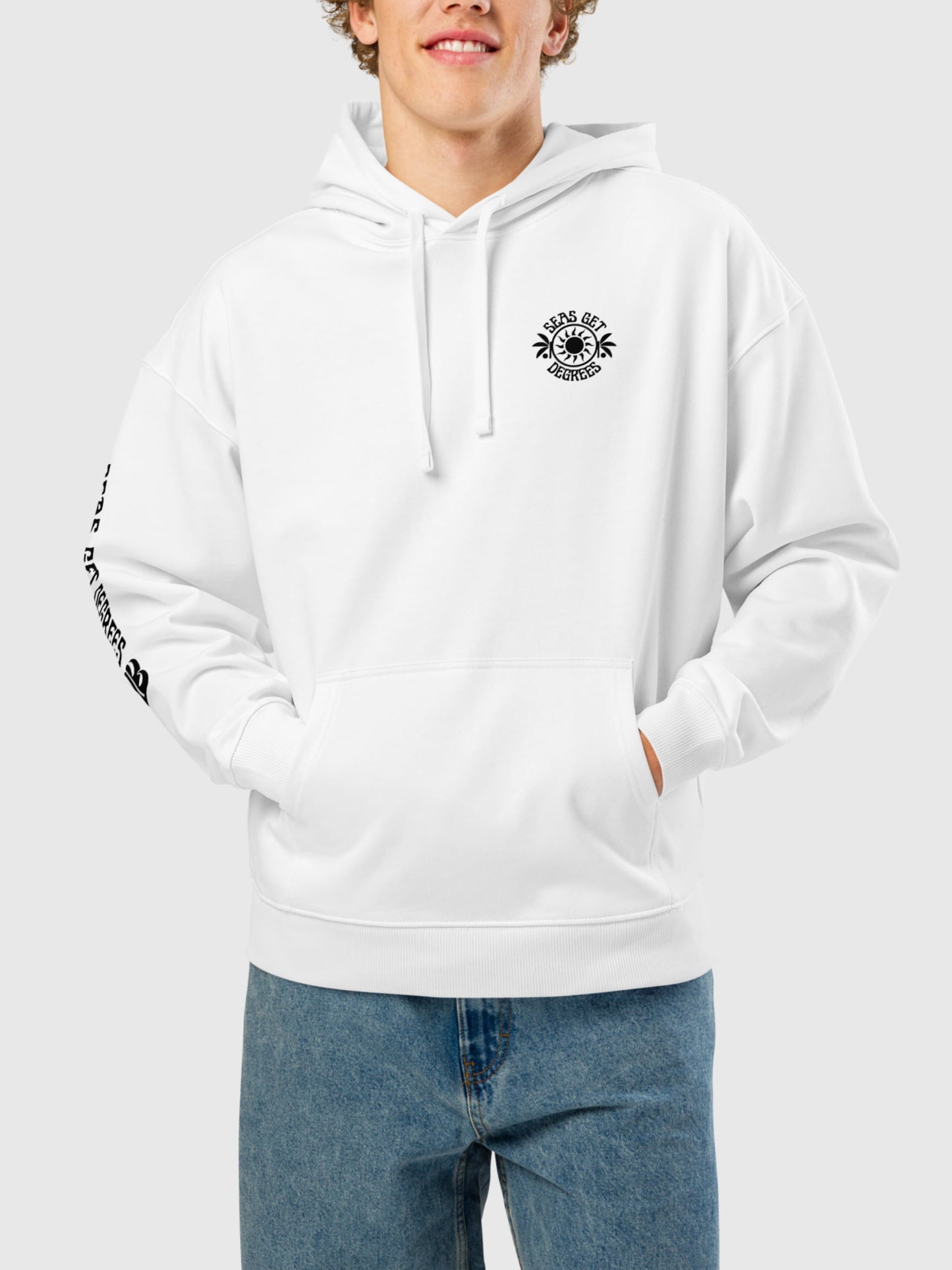 Model wearing Sun and Shade Oversized Hoodie front in white — Seas Get Degrees men's coastal hoodie