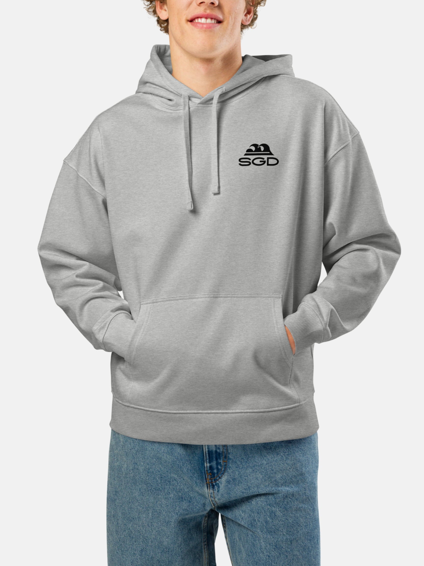 Model wearing Til Last Wave Oversized Hoodie front in heather grey — Seas Get Degrees men's coastal hoodie